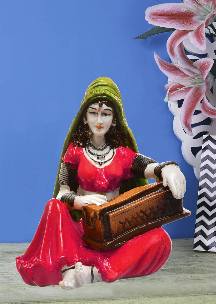 The Serenade of Rajasthan: Hand-Painted Resin Woman and Her Harmonium - Karigaari India Aesthetic Home Decor