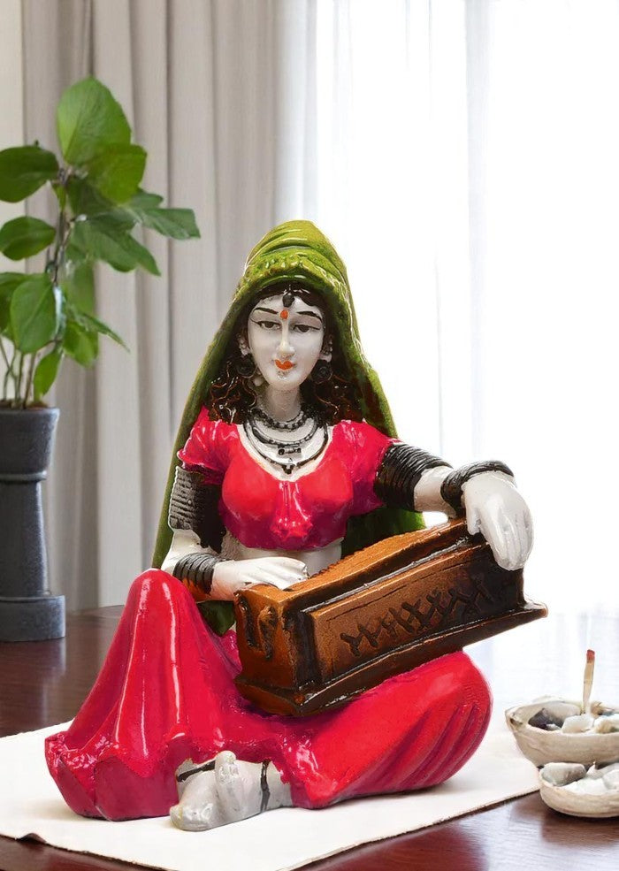 The Serenade of Rajasthan: Hand-Painted Resin Woman and Her Harmonium - Karigaari India Aesthetic Home Decor