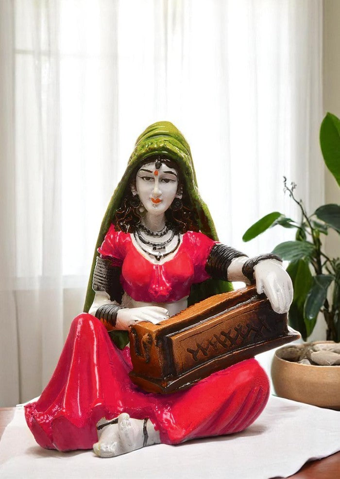 The Serenade of Rajasthan: Hand-Painted Resin Woman and Her Harmonium - Karigaari India Aesthetic Home Decor