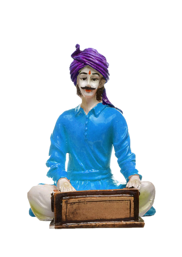 The Silent Symphony of Rajasthan: Hand-Painted Resin Man and His Harmonium's Tale - Karigaari India Aesthetic Home Decor