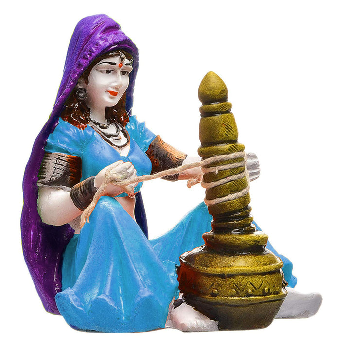 Heritage Homemaker Figurine: Hand-Painted Resin Rajasthani Woman with Butter Churn - Karigaari India Aesthetic Home Decor