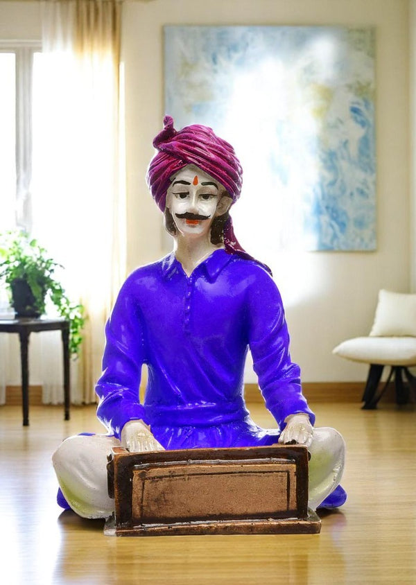 The Soulful Strains of Rajasthan: Hand-Painted Resin Man and His Harmonium - Karigaari India Aesthetic Home Decor