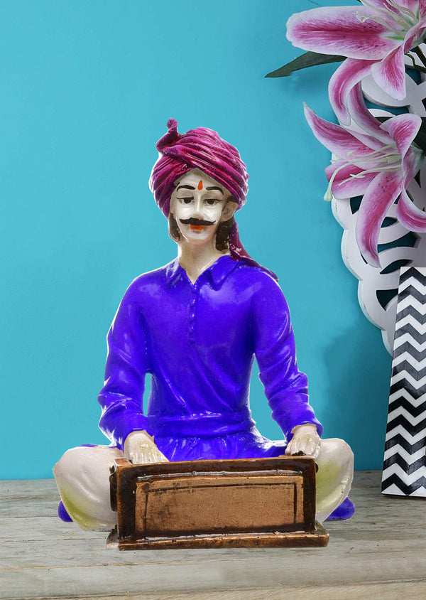 The Soulful Strains of Rajasthan: Hand-Painted Resin Man and His Harmonium