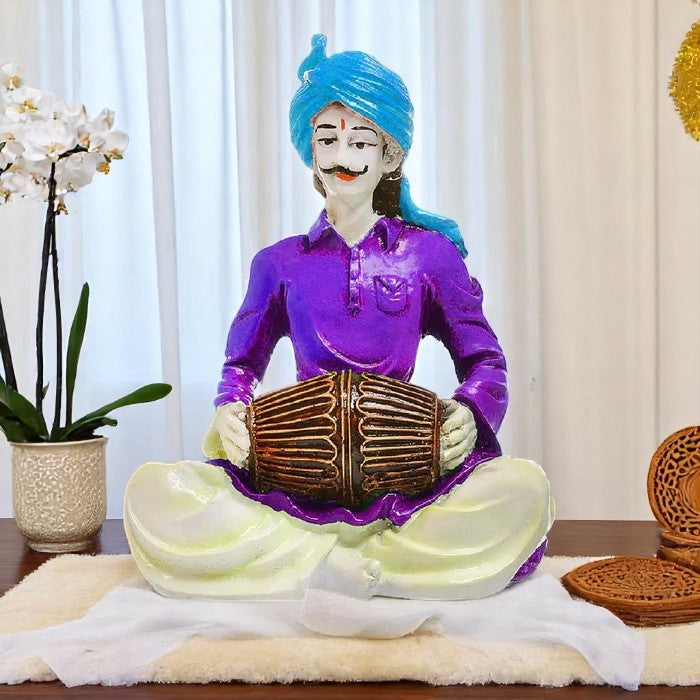 Joyful Beats of Rajasthan: Exquisite Resin Sculpture of a Folk Musician with Drum - Karigaari India Aesthetic Home Decor