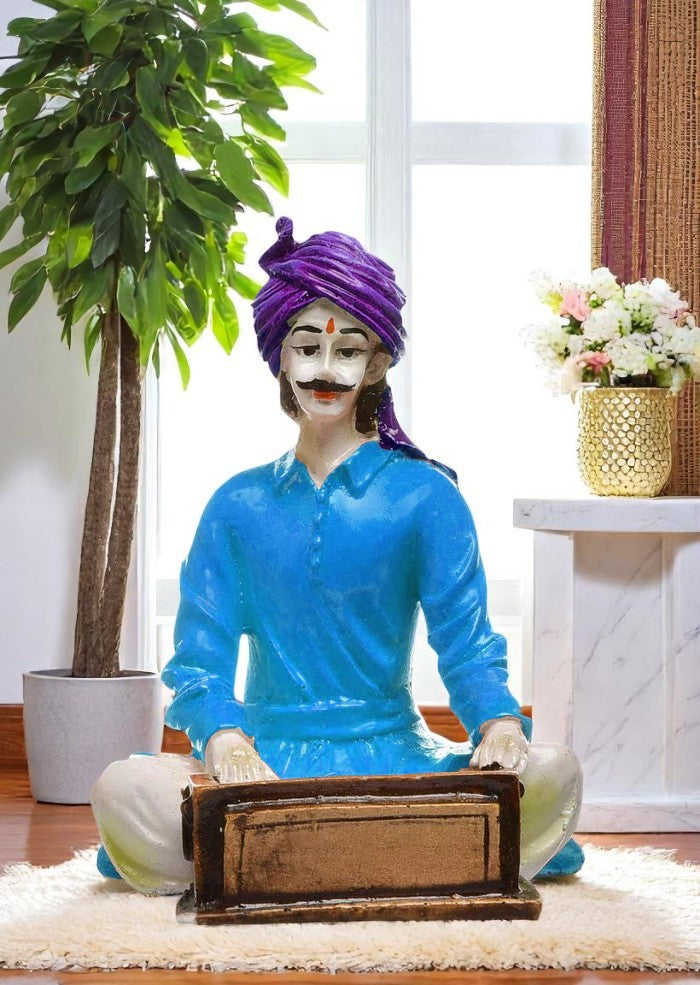 The Silent Symphony of Rajasthan: Hand-Painted Resin Man and His Harmonium's Tale - Karigaari India Aesthetic Home Decor