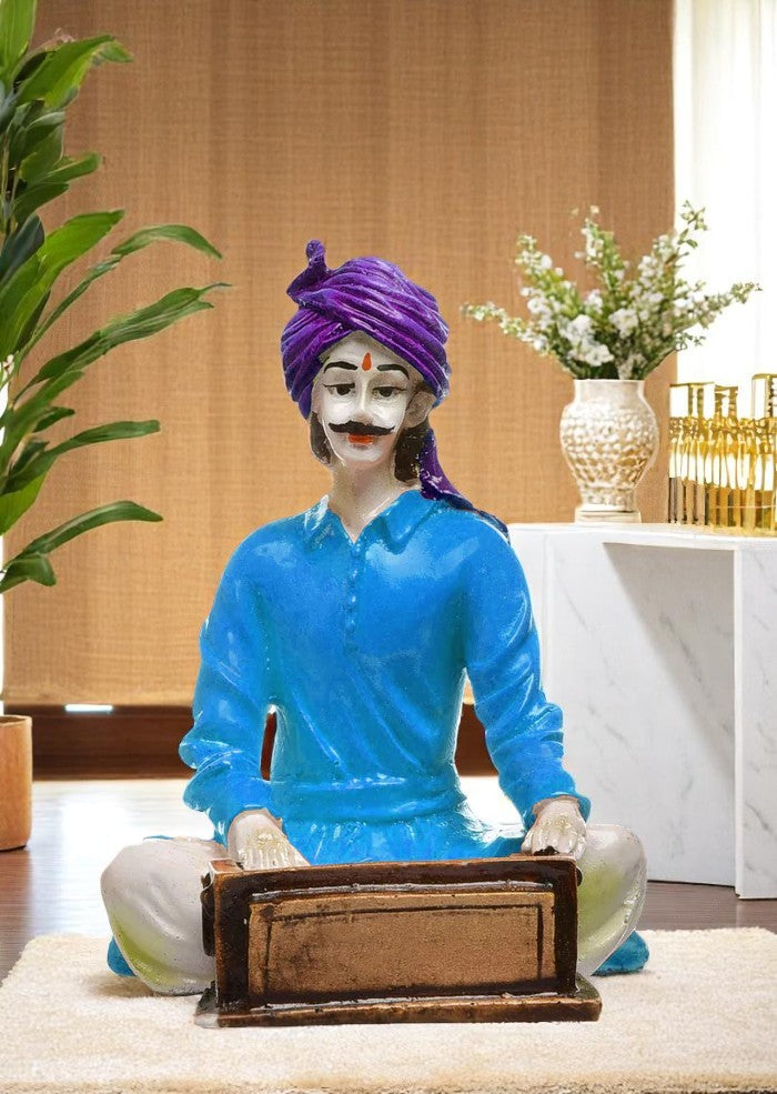 The Silent Symphony of Rajasthan: Hand-Painted Resin Man and His Harmonium's Tale - Karigaari India Aesthetic Home Decor