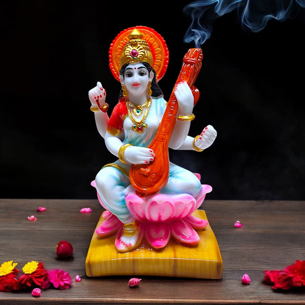 Karigaari India Saraswati Idol for Home Decor and Puja | Resin Mata Saraswati Murti on Lotus | Perfect Gift for Students, Teachers, Vasant Panchami, Mandir Decor | Goddess of Knowledge Statue